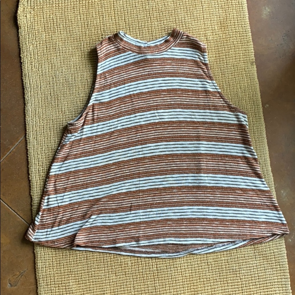 Swing tank